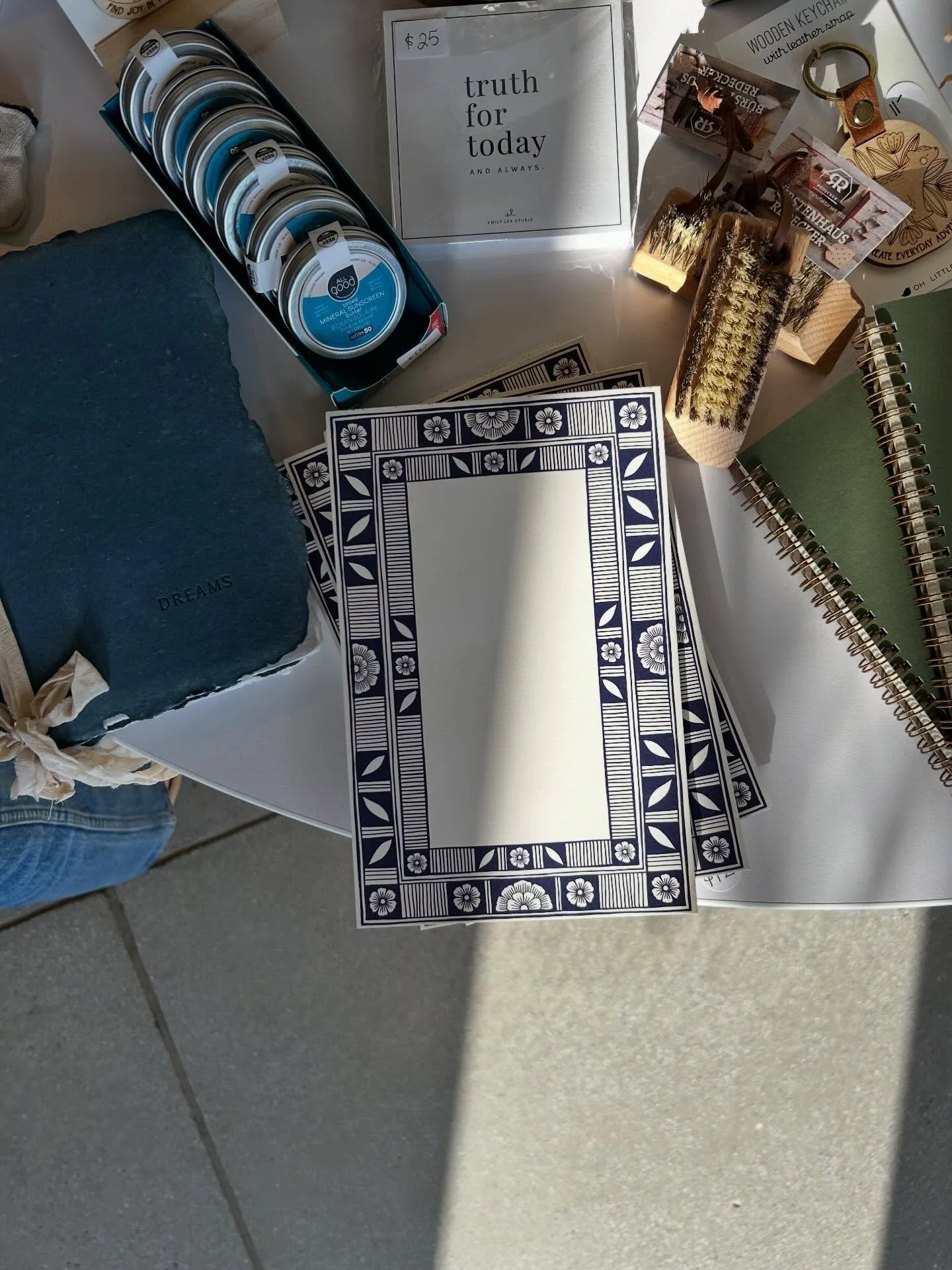 Gorgeous, new notebooks and from Katherine Watson. These are super beautiful and they came packaged plastic free, which is always our favorite. We have a couple that have different designs and magnets on the back but this one here is just a notepad. 