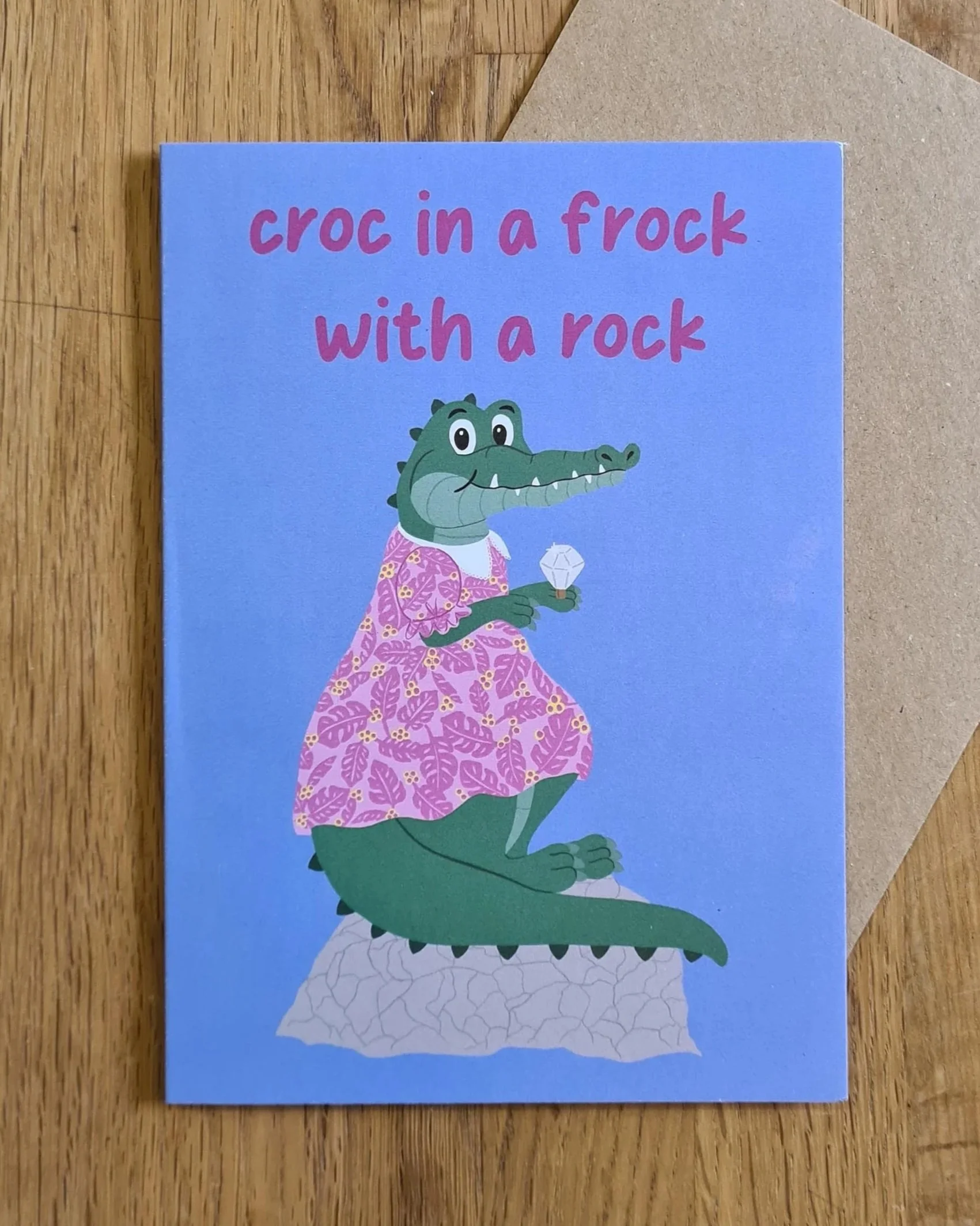 CROC IN A FROCK WITH A ROCK ENGAGEMENT CARD