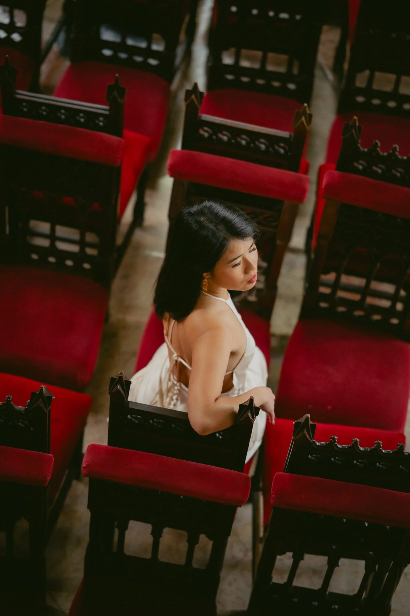 Cinematic portrait of a woman in Lisbon inside a palace