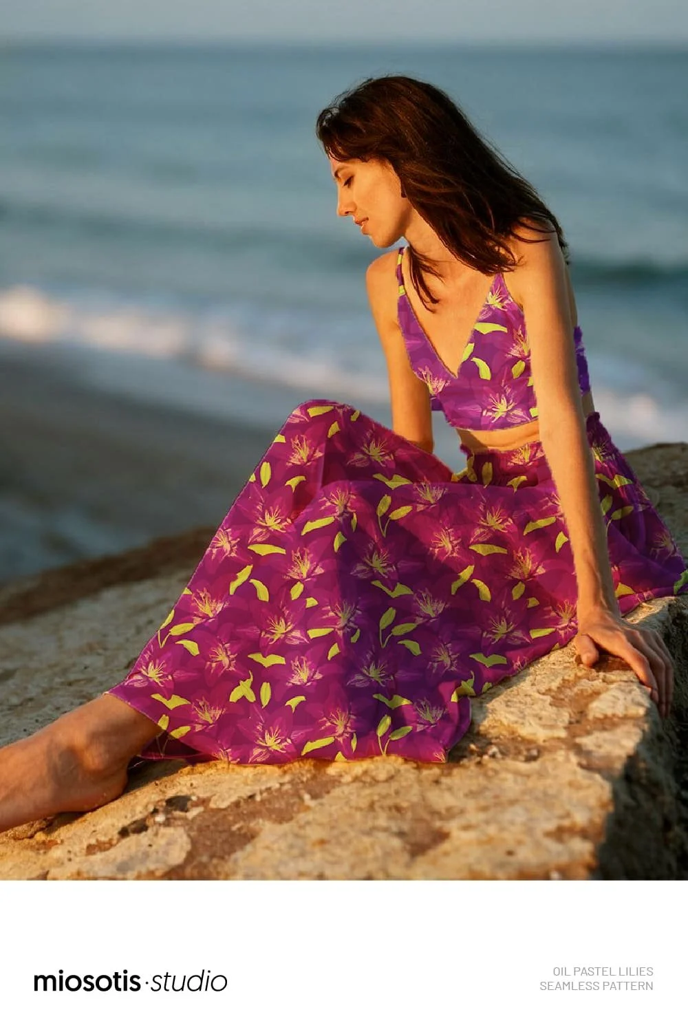 Woman wearing colourful beachwear featuring the bold oil pastel lilies pattern, showcasing the floral pattern design.