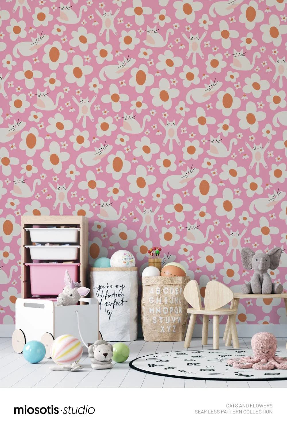 Children’s room featuring a playful cats and flowers wallpaper pattern in pink, yellow, orange and cream.