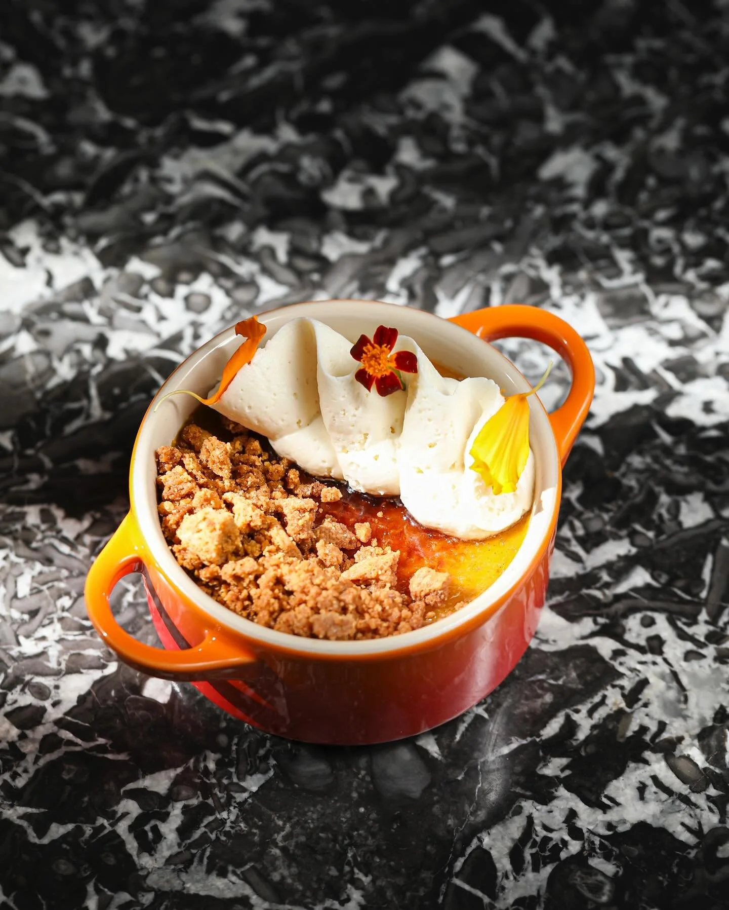 New on the menu &mdash; a golden twist on pumpkin season. 🎃✨

Made with pumpkins from @littlesaintfarm, our Pumpkin Cr&egrave;me Br&ucirc;l&eacute;e with a ginger snap cookie and cream cheese mousse debuts tomorrow, Monday, November 3, on our Neighb