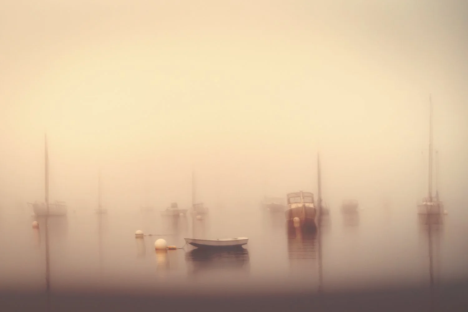 A foggy Maine Harbor at daybreak 