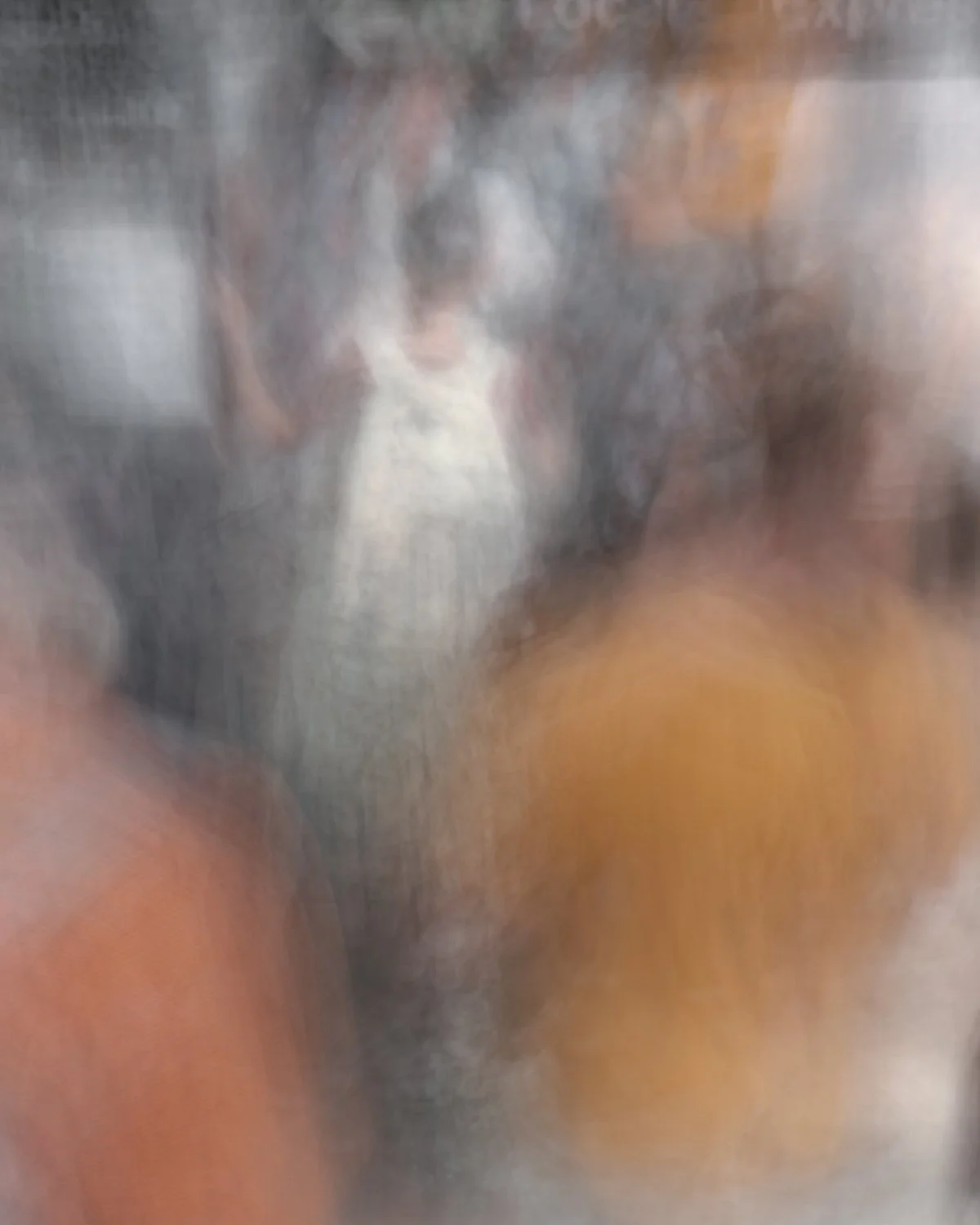  Images become more abstract when multiple figures are in motion.  In this instance the girl in the white dress is perfectly framed by those moving around her. 