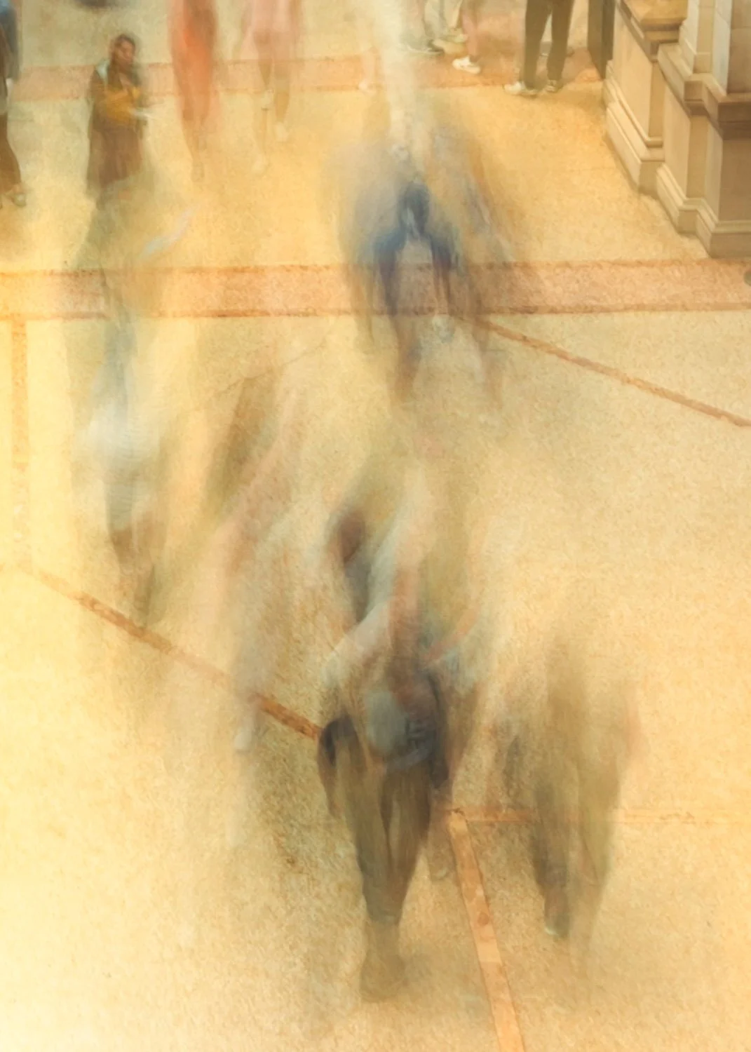  Abstraction becomes even more evident when there is no clear intent to follow a single subject.  Here, varying degrees of blur create layers of recognition, where figures emerge less through detail than through suggestion. 