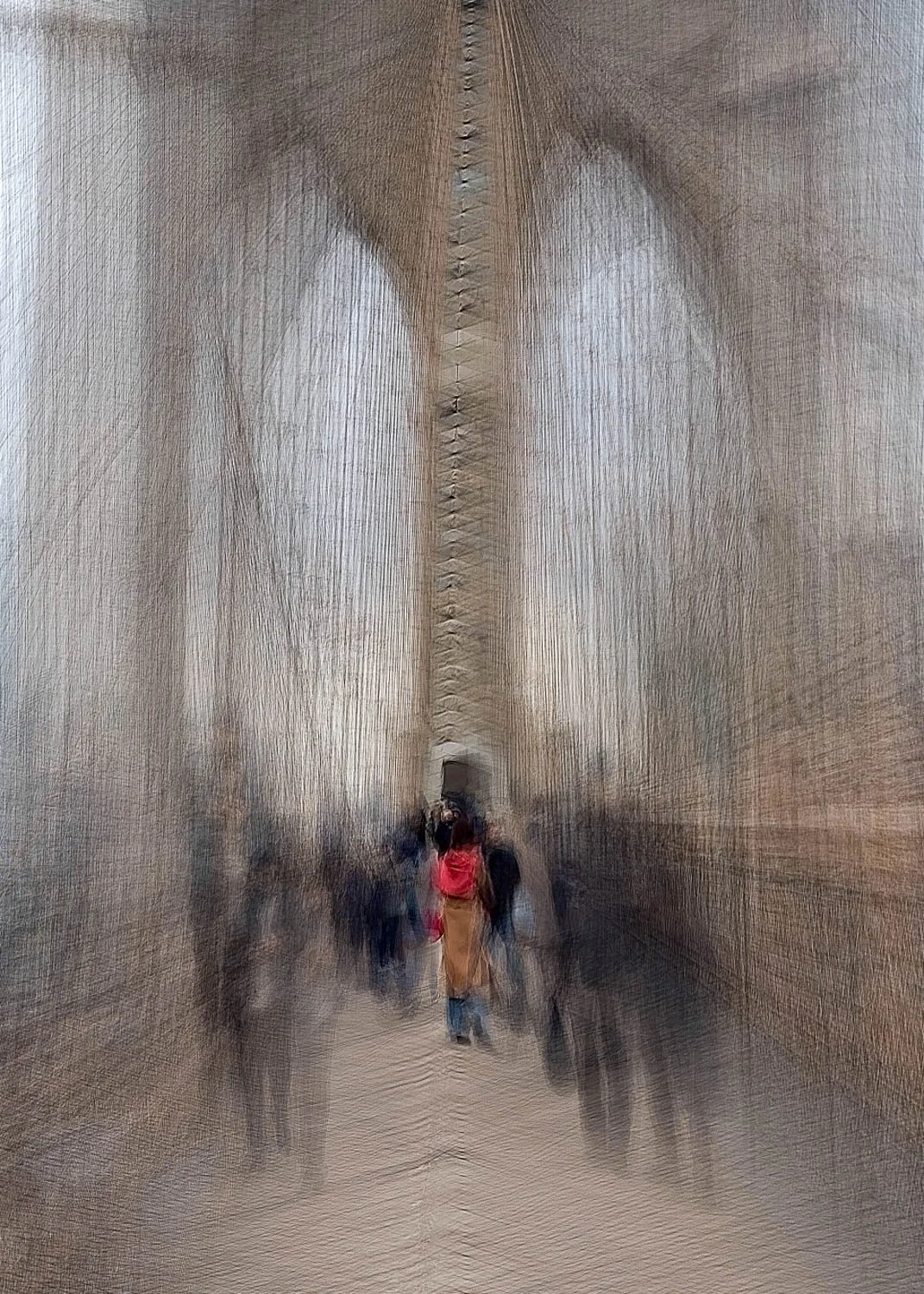 Abstract ICM Bluristic  photo - Blurry photo of a group of people walking on a bridge with cables and towers, likely the Brooklyn Bridge in New York City.