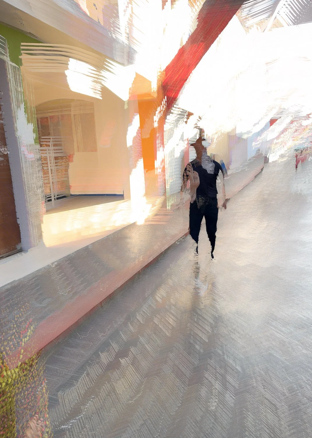 Abstract ICM Bluristic  photo - A person walking on a sidewalk near a building with large glass windows, captured with a distorted, abstract effect.