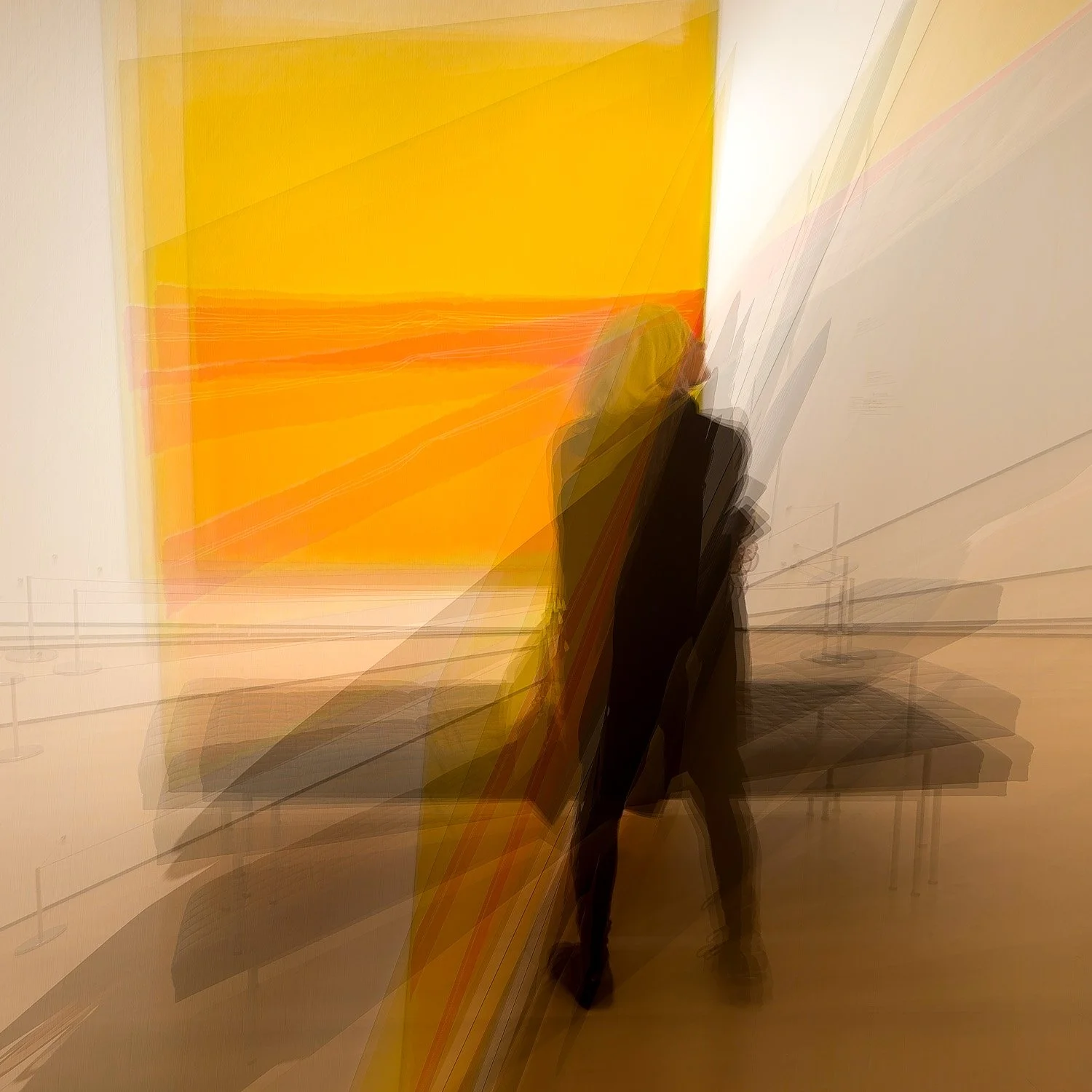 Abstract ICM Bluristic  photo - Blurry image of two people walking past an abstract, colorful painting in an art gallery.