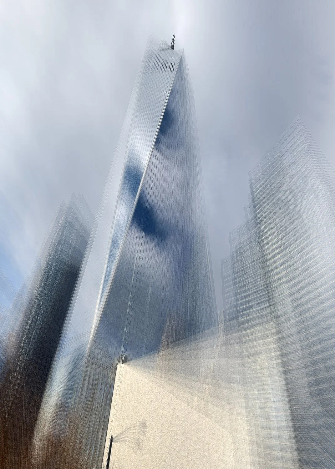 Abstract ICM Bluristic  photo - view of a tall glass skyscraper with reflective glass windows, surrounded by other skyscrapers on a cloudy sky.