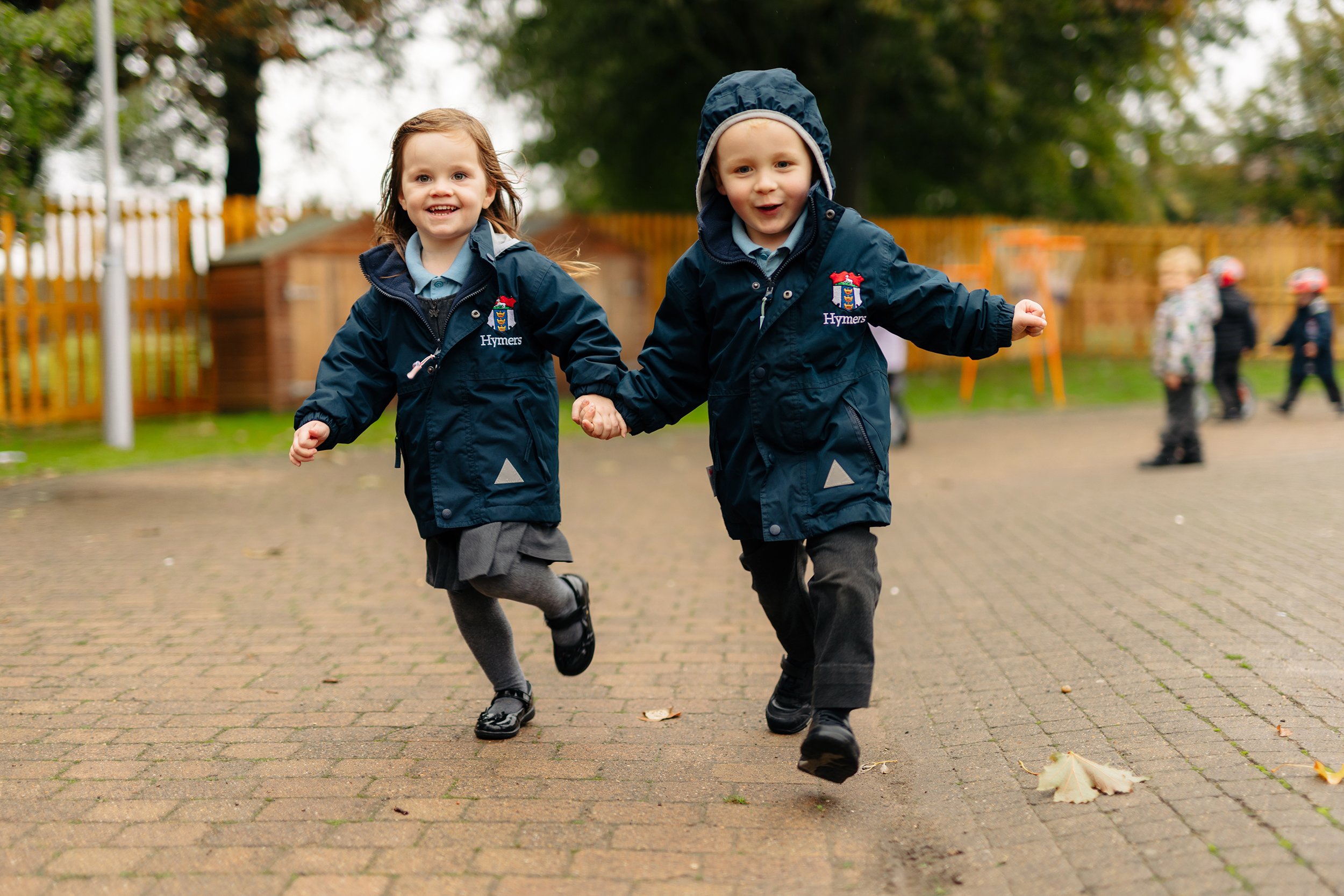 Infant School pupil dropping off child