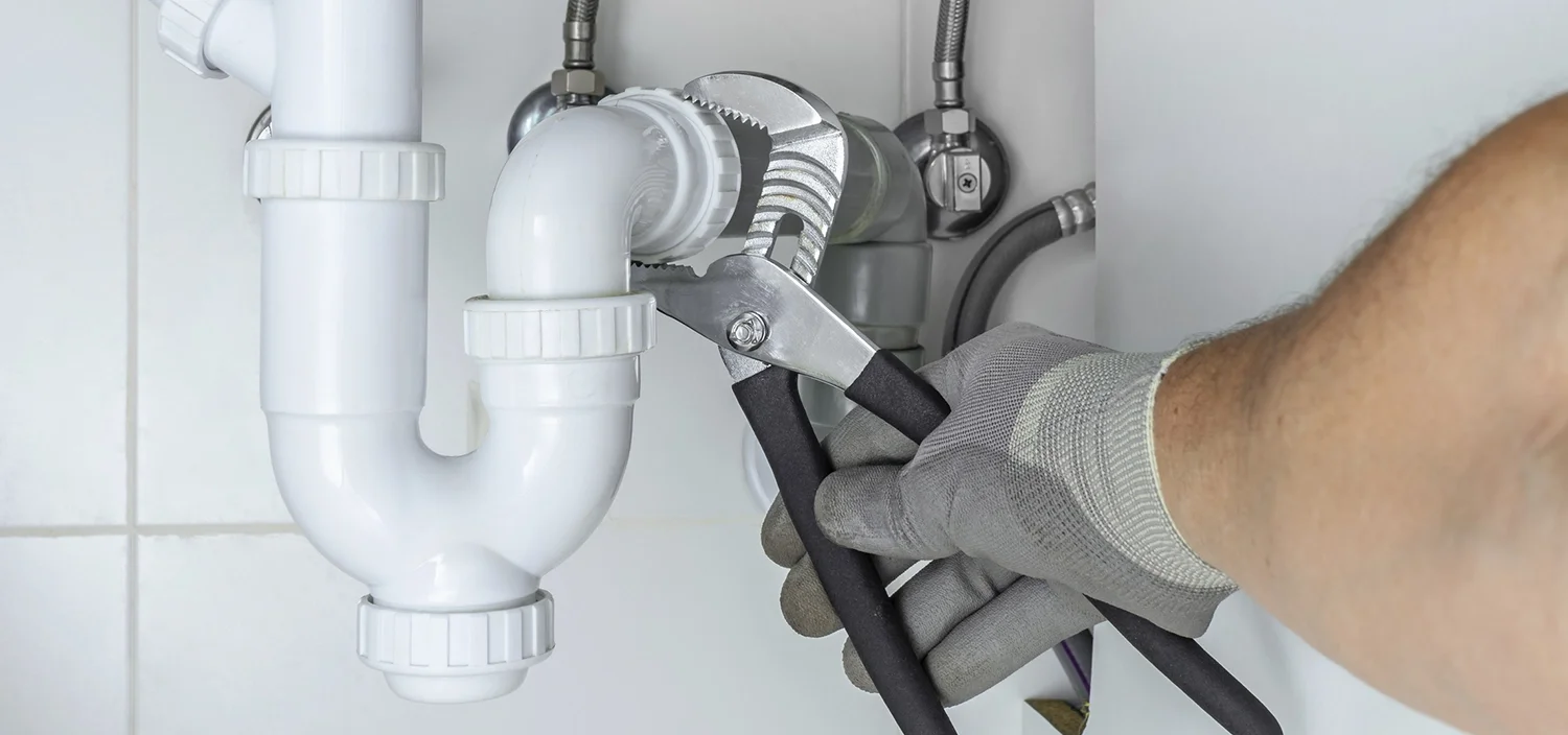 Plumber working on DWV Example