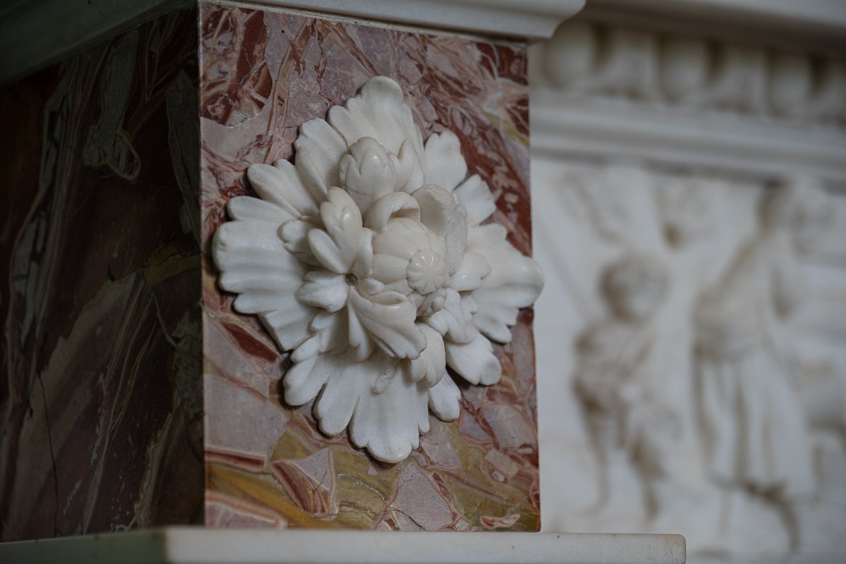 Hand carved marble detail on the fireplace