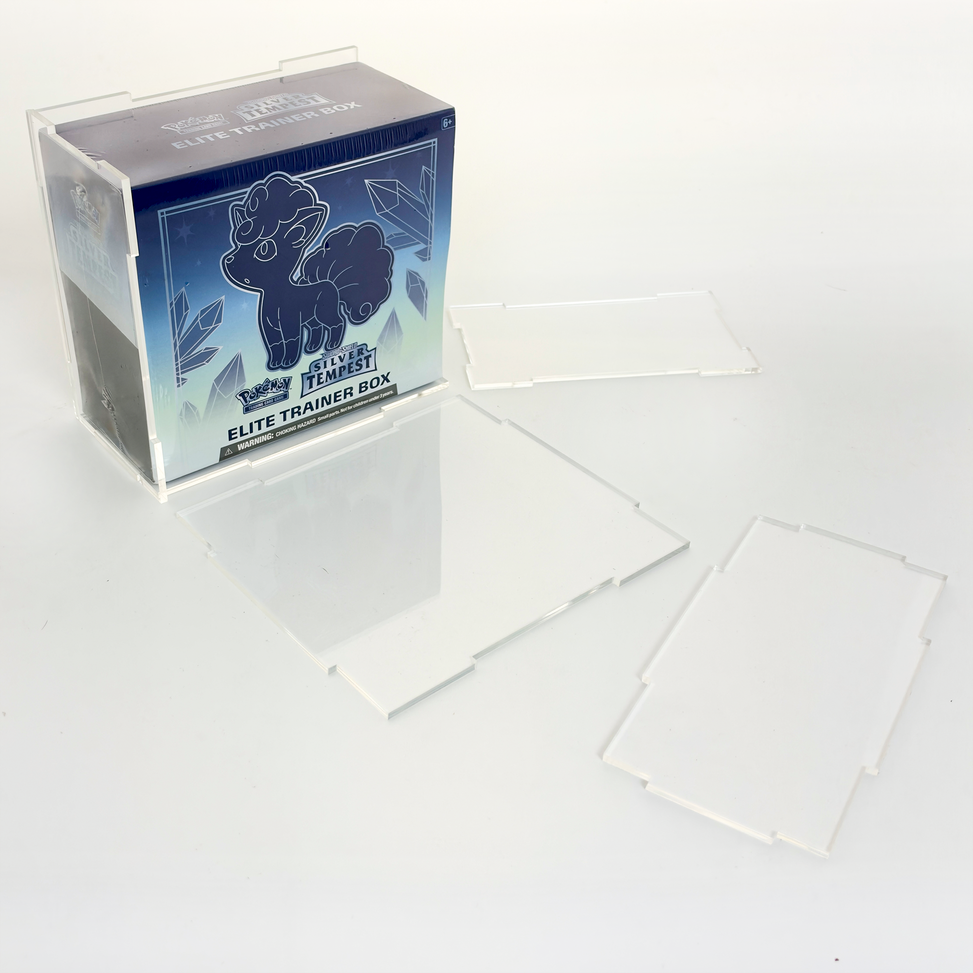 A Pokémon trading card game Elite Trainer Box for Pokémon Sword and Shield Silver Tempest, featuring a blue background and a depiction of a Pokémon.