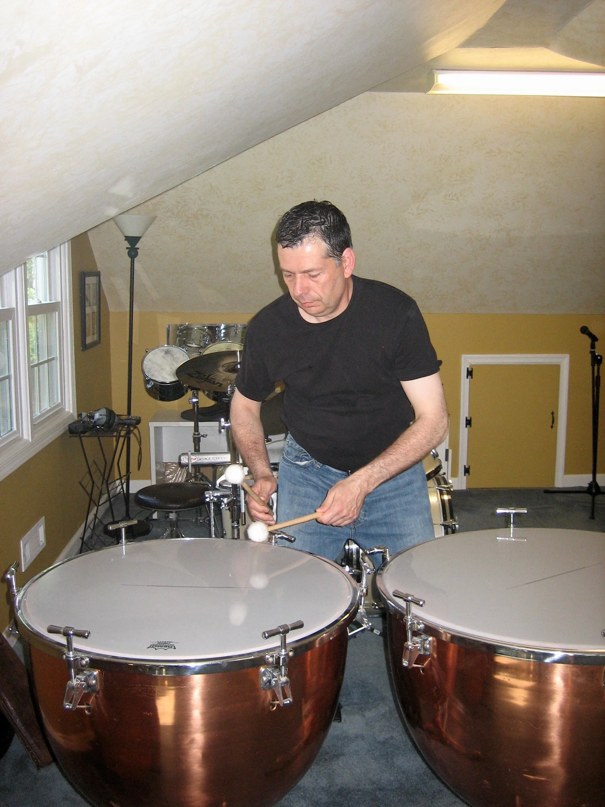 In my studio with my Leedy timpani. When I studied with Morris Lang, I bought these from a Broadway percussionist. Friend and percussionist, Mark Cristofaro, did a fabulous job of restoring them.