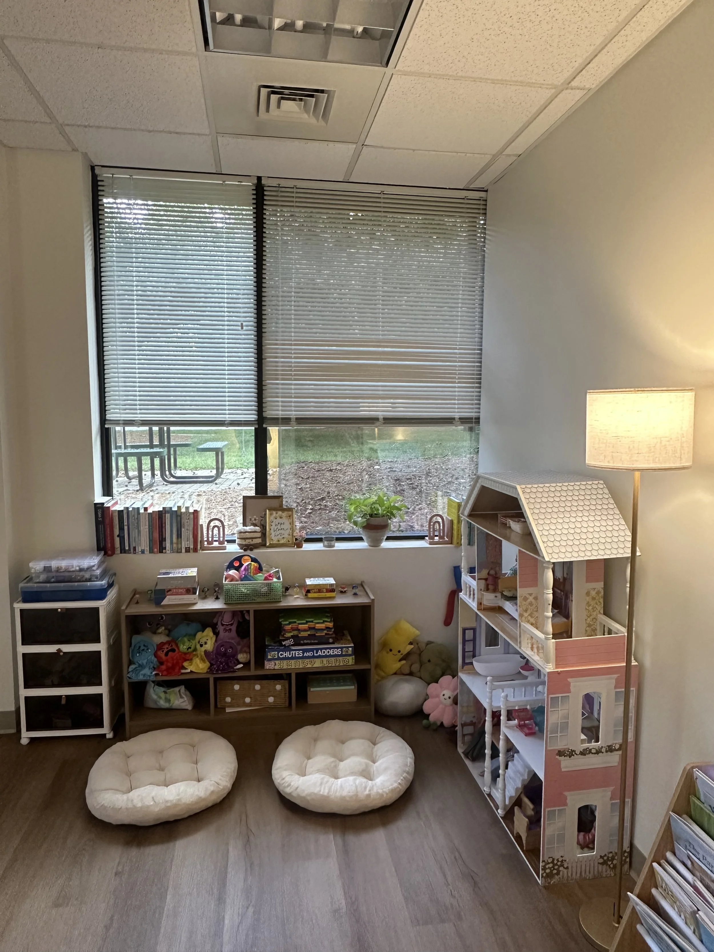 This side of the office has toys, games, fidgets, and hands-on activities to make therapy for kids feel a little easier and more engaging.