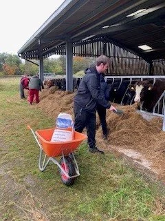 PHOTO FROM CHARITY: Student Callum and wheelbarrow.jpg