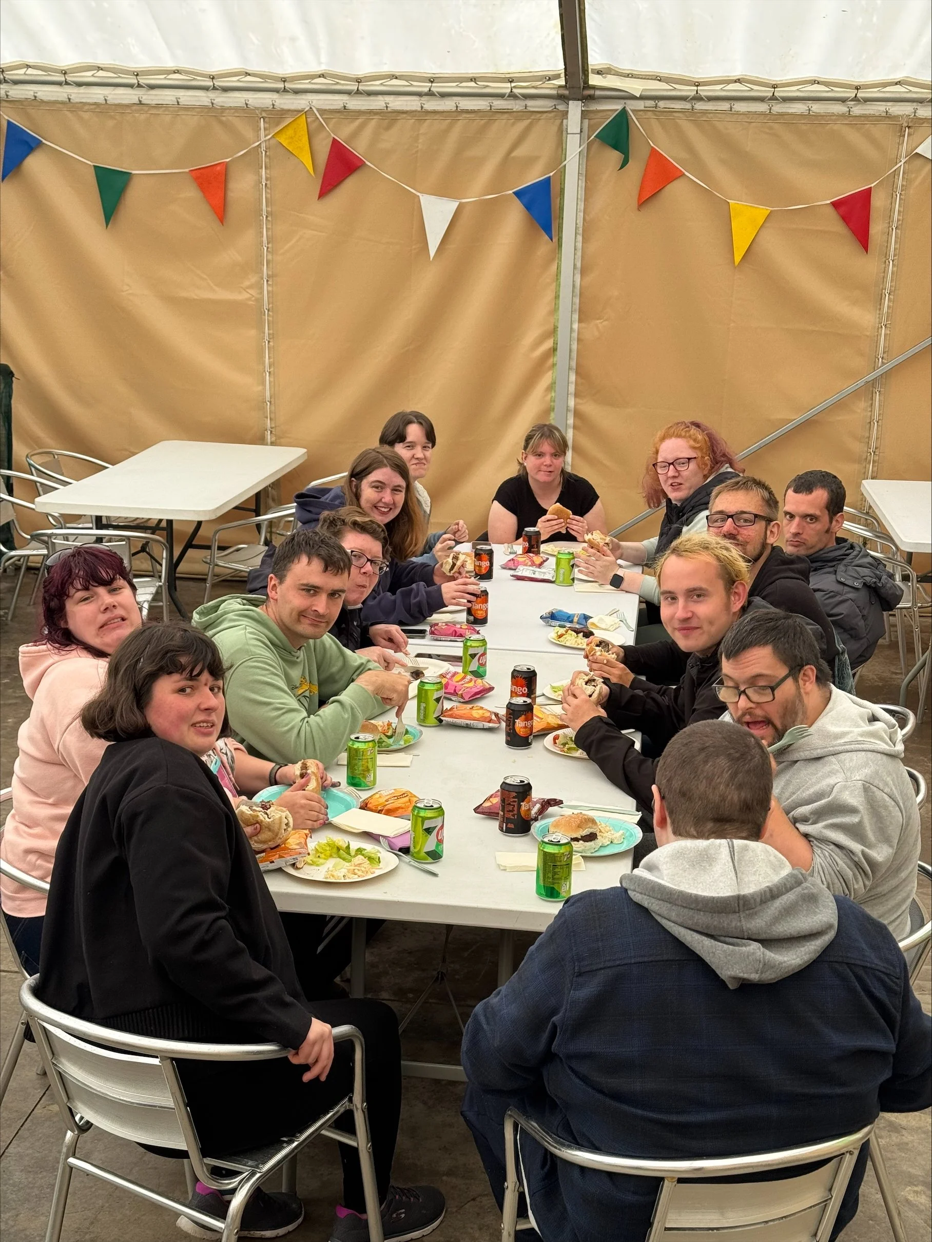 PHOTO FROM CHARITY: Student group photo BBQ dinner .jpeg