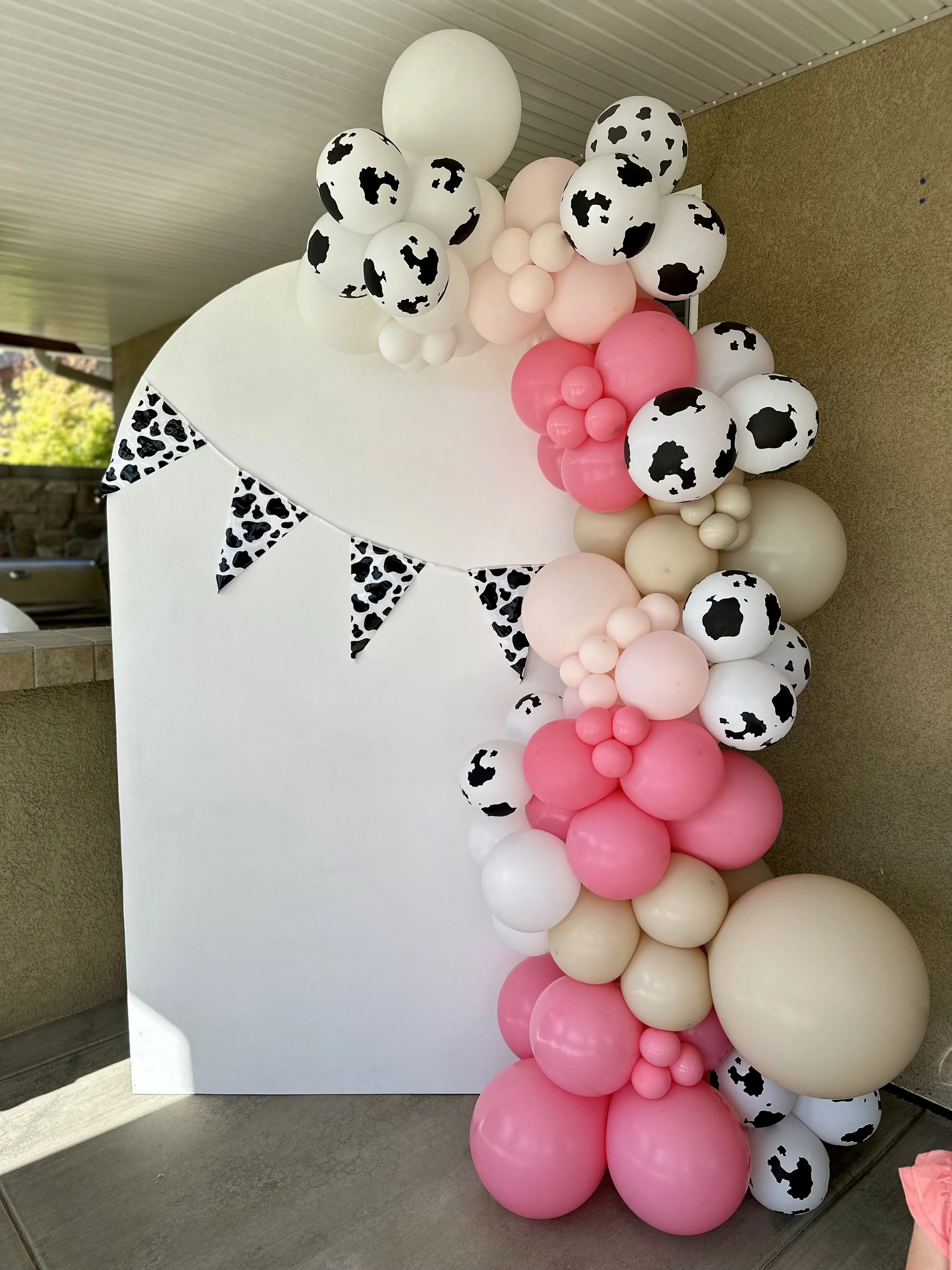 10 ft. balloon garland with cow print balloons, blush baby pink, flamingo pink, & white sand
