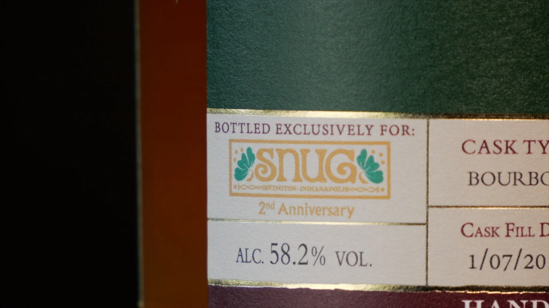 Snug Logo (Bottled Exclusively Label).jpg
