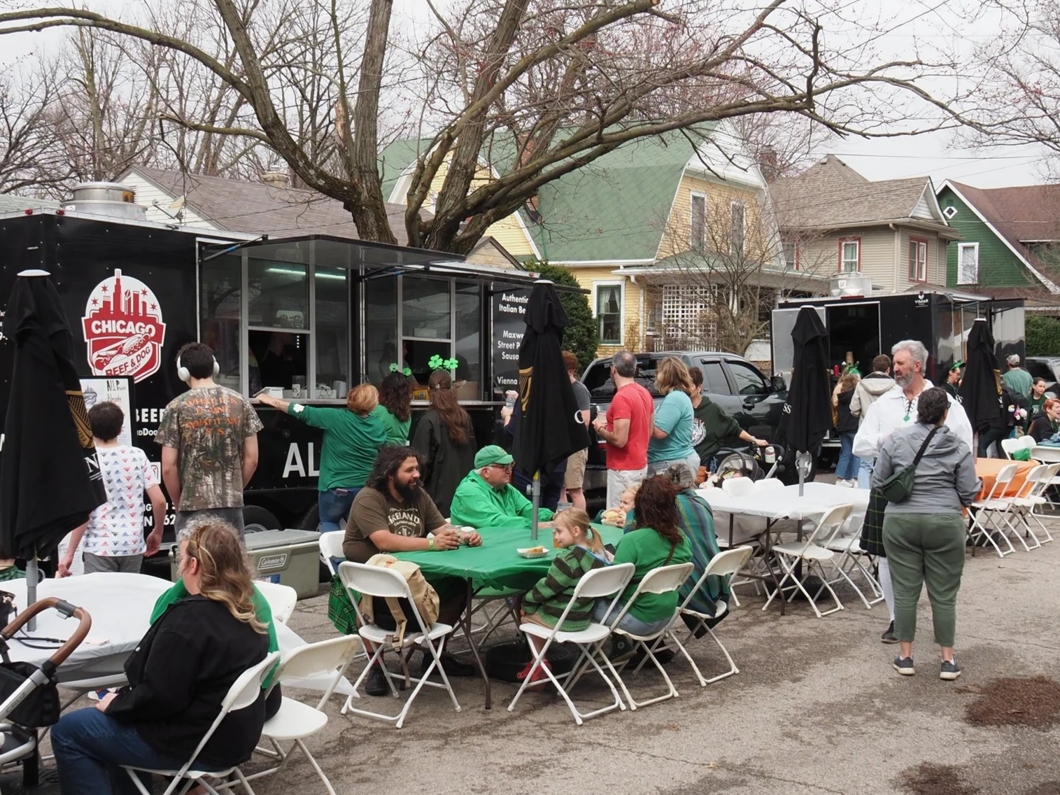 Tables, chairs and food trucks at Snug St. Patrick's Day 2025