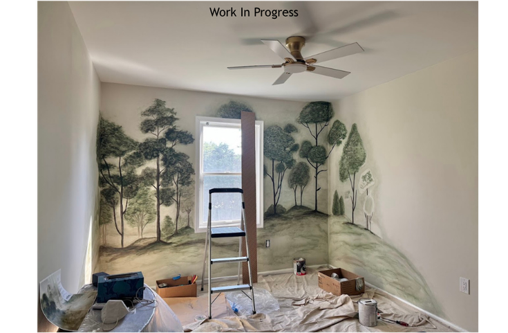 Work in progress: the hand-painted forest mural as a focal point while creating an immersive, nature-inspired space.