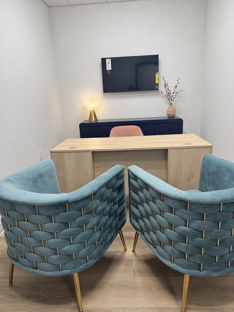 Commercial Interior Design: Owner’s office at a wellness center in Spring House, PA, with personalized details like brass finishes, deep blue tones, and a velvety, forest-inspired feel.