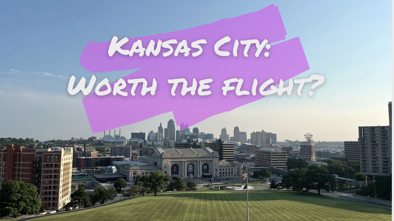 Skyline of Kansas City with a park in the foreground and a large building with flags, overlaid with purple paint strokes and white text that says 'Kansas City: Worth the Flight?'