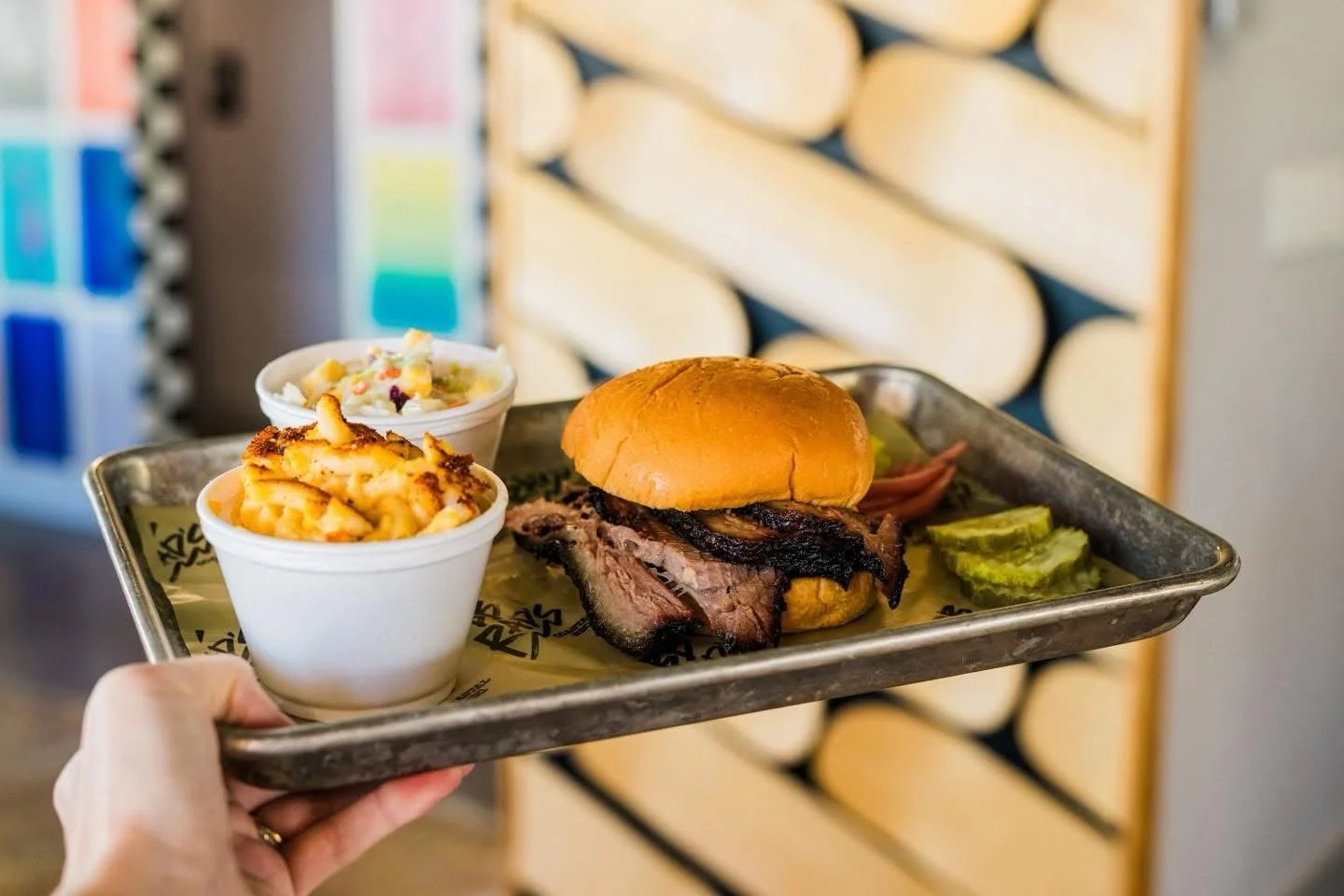 Brisket sandwich with mac and cheese and mango slaw at BB Rad's Coastal BBQ in Titusville, Florida