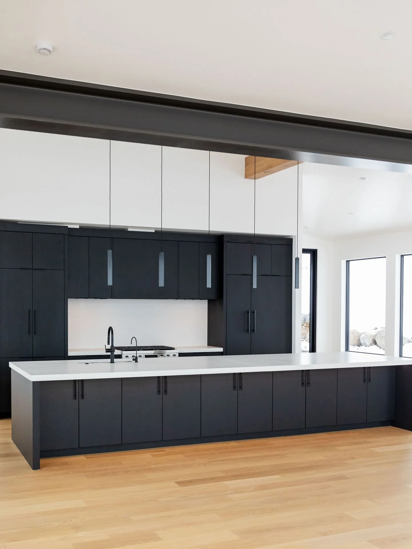 Every fixture, every texture, every pull of a cabinet door... a kitchen communicates craft before a single meal is made. The sink fixture that feels substantial in your hand. The light that warms the whole room without trying to. The cabinet face tha