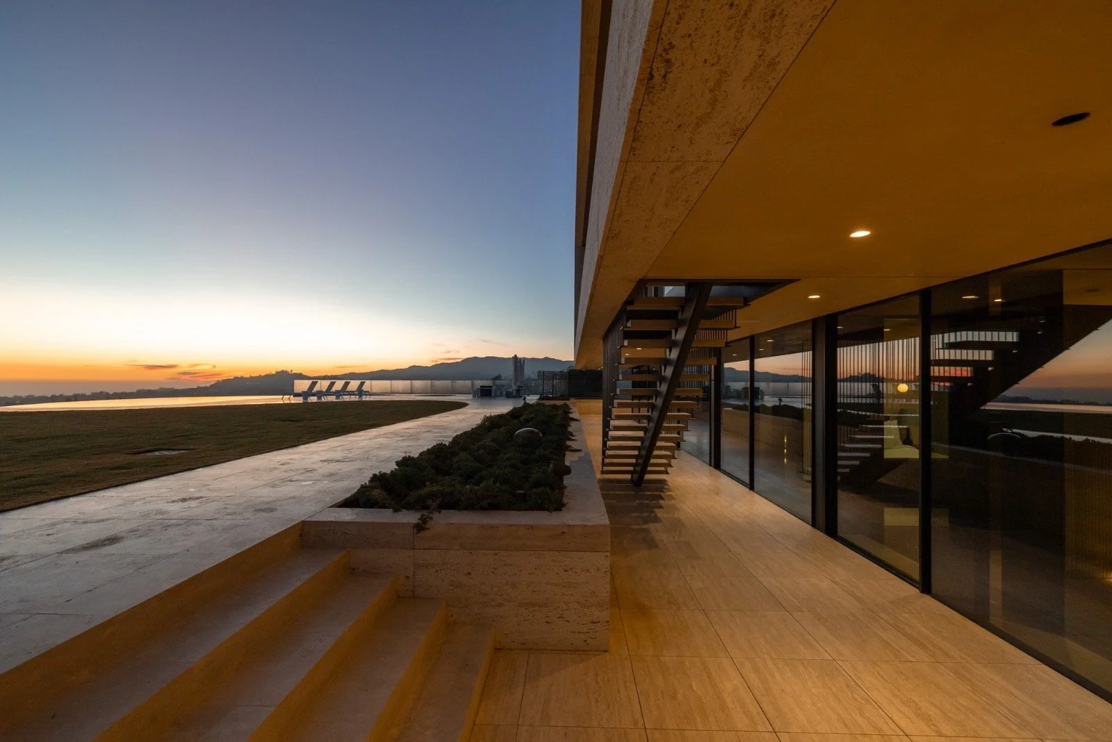 684-Firth-Brentwood-CA-LA-Exterior-Sunset-Patio-Floating-Staircase-Travertine-Flooring-Ocean-View-Roderick-Builders-Modern-Home.JPG
