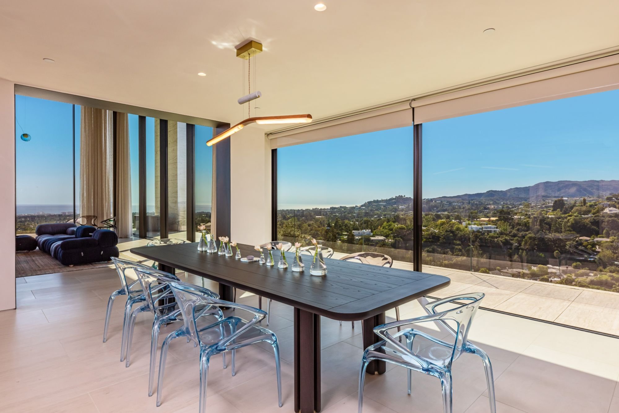 684Firth-Brentwood-CA-LA-Dining-Room-Panoramic-City-View-Floor-to-Ceiling-Glass-Ghost-Chairs-Modern-Table-Roderick-Builders-Modern-Home.jpg