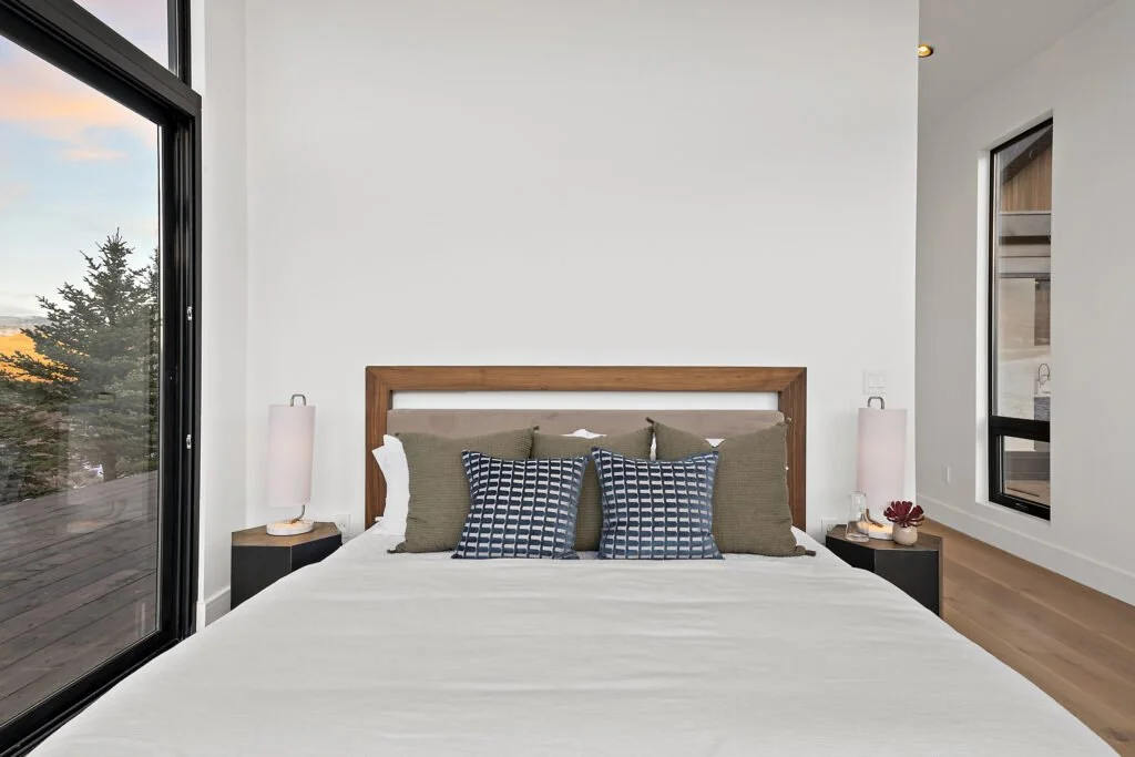 Icon-House-Benloch-Heber-City-Bedroom-Wood-Headboard-Modern-Nightstands-Large-Window-View-Roderick-Builders-Modern-Custom.jpg