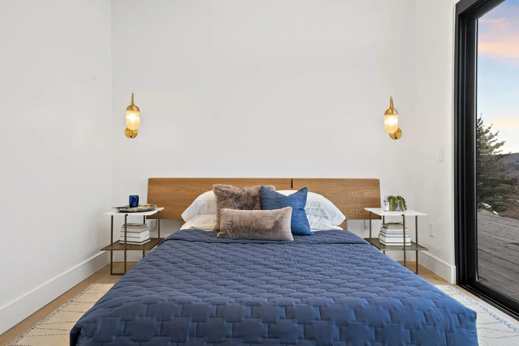 Icon-House-Benloch-Heber-City-Bedroom-Wood-Headboard-Brass-Sconces-Modern-Nightstands-Roderick-Builders-Modern-Custom.jpg