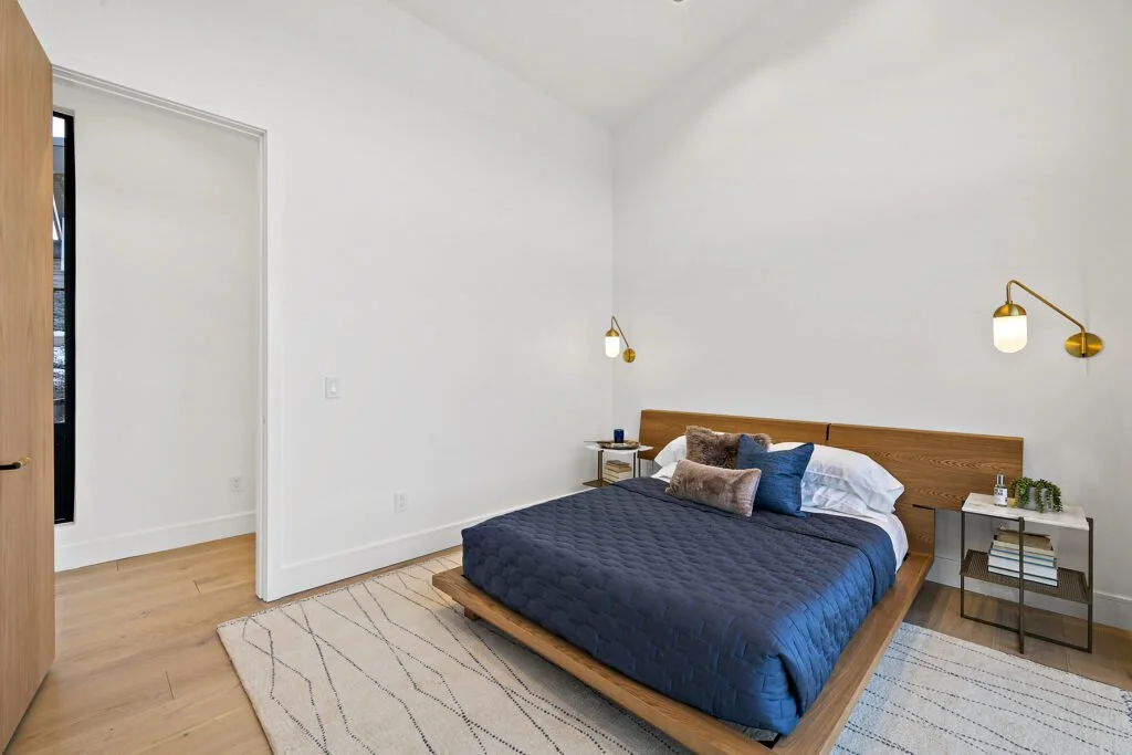 Icon-House-Benloch-Heber-City-Bedroom-Wood-Platform-Bed-Brass-Sconces-Minimalist-Design-Roderick-Builders-Modern-Custom.jpg