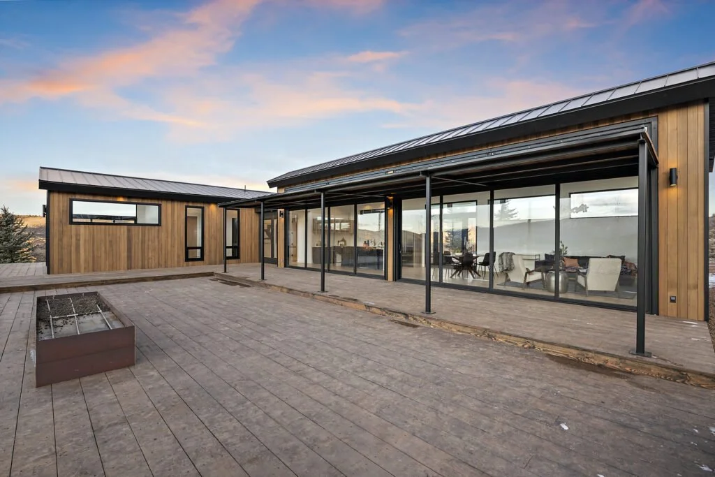 Icon-House-Benloch-Heber-City-Exterior-Wood-Deck-Covered-Patio-Sunset-View-Wood-Siding-Roderick-Builders-Modern-Custom.jpg