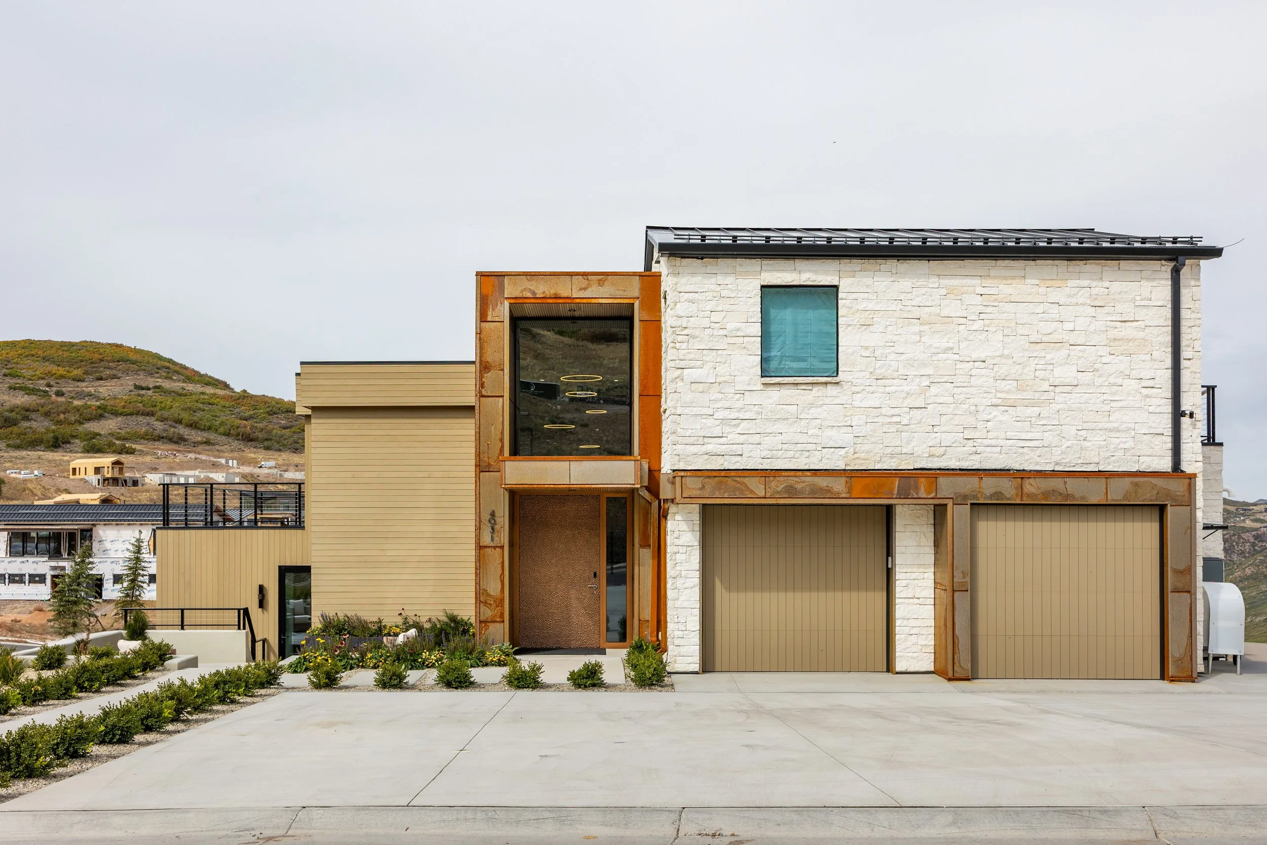 Benloch-134-Heber-City-Front-View-Driveway-Hemlock-Corten-Metal-Limestone-Roderick-Builders-Mountain-Modern.jpg