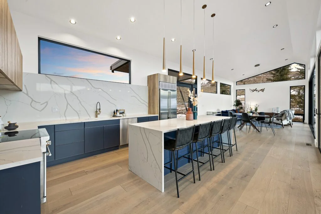 Icon-House-Benloch-Heber-City-Kitchen-Dining-Open-Concept-Blue-Cabinets-Quartz-Island-Vaulted-Ceiling-Roderick-Builders-Modern-Custom.jpg