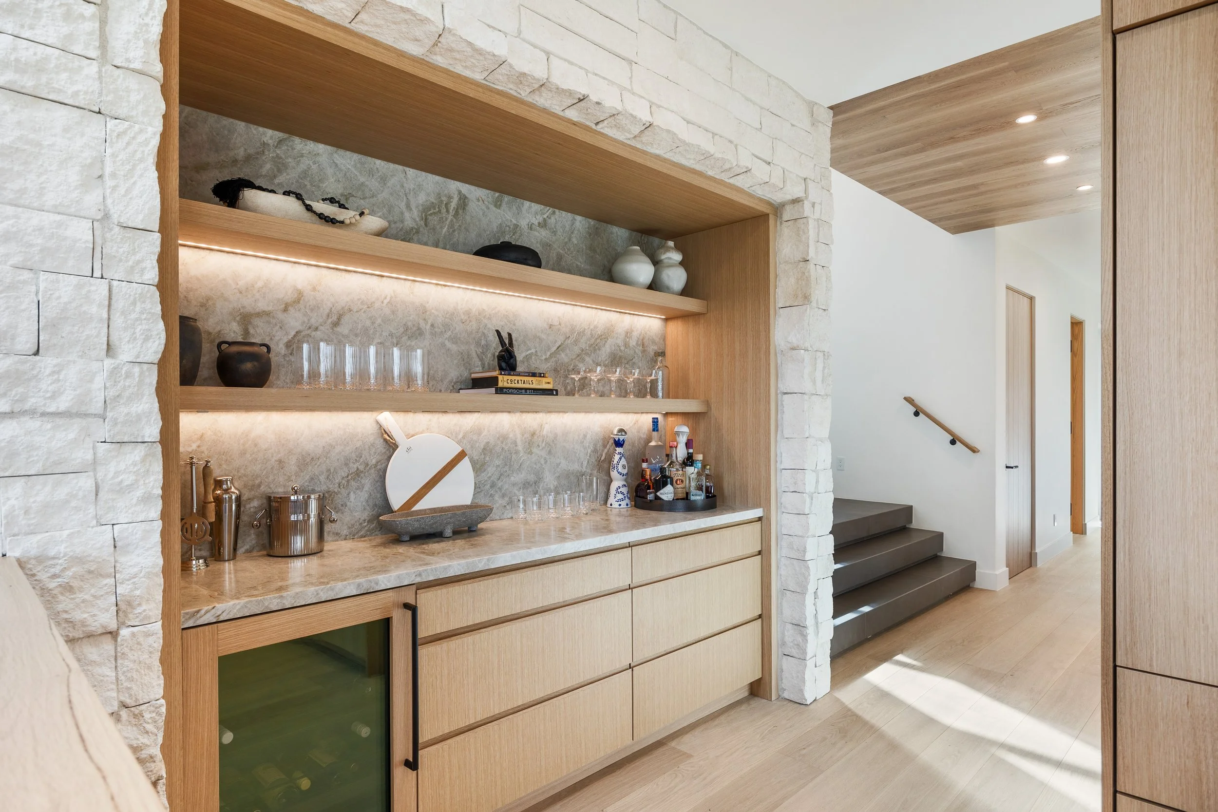 Benloch-134-Heber-City-Modern-Contemporary-Wet-Bar-Oak-Cabinetry-Stone-Backsplash-Open-Shelves-Underlighting-Roderick-Builders-Mountain-Modern.jpg