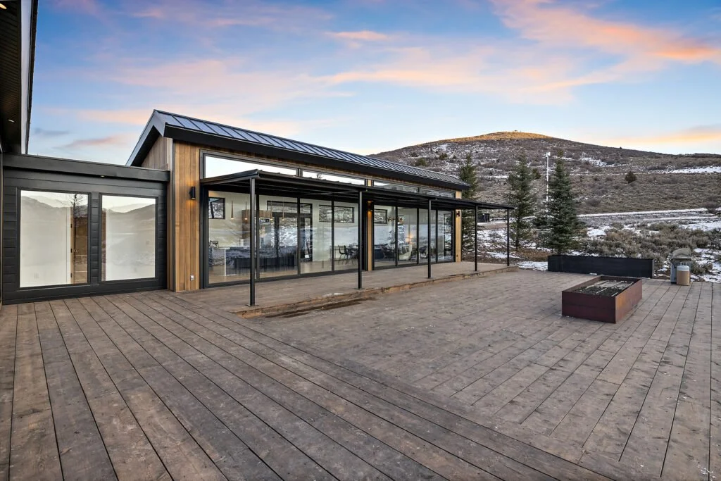 Icon-House-Benloch-Heber-City-Exterior-Large-Wood-Deck-Covered-Patio-Fire-Pit-Mountain-View-Roderick-Builders-Modern-Custom.jpg