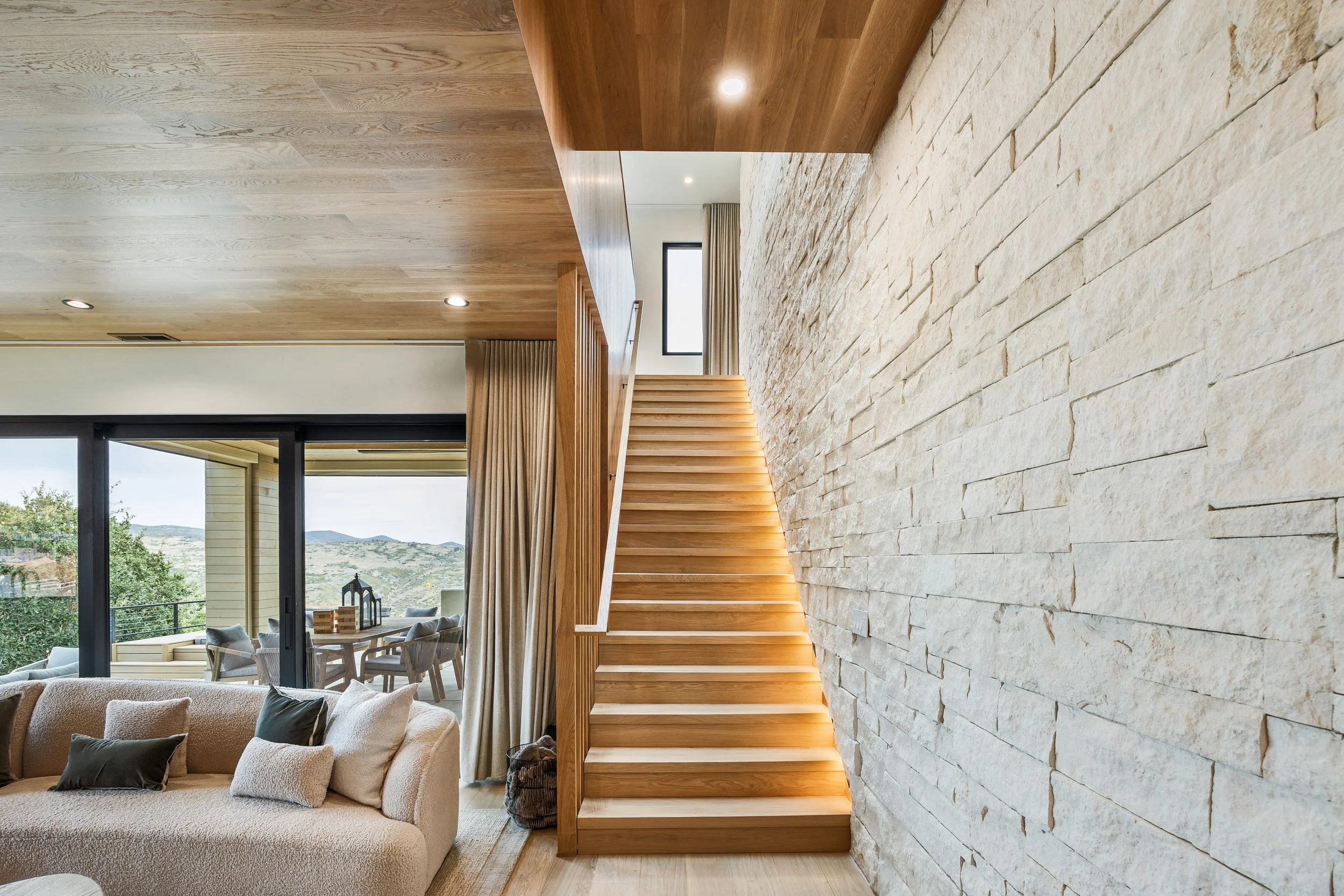 Benloch-134-Heber-City-Living-Area-Stairs-Natural-Oak-Limestone-Lighted-Scandinavian-Roderick-Builders-Mountain-Modern.jpg