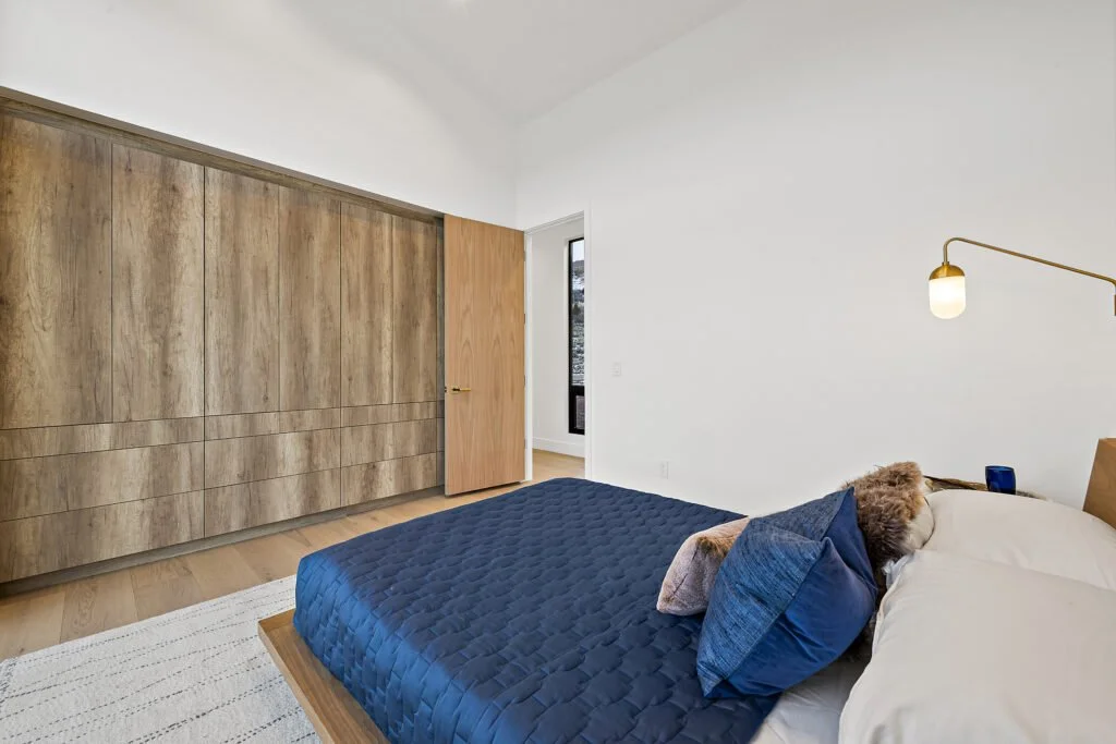 Icon-House-Benloch-Heber-City-Bedroom-Full-Wall-Wood-Wardrobe-Custom-Cabinetry-Minimalist-Design-Roderick-Builders-Modern-Custom.jpg
