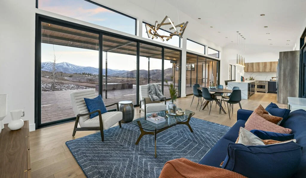 Icon-House-Benloch-Heber-City-Living-Room-Sliding-Glass-Doors-Mountain-View-Geometric-Rug-Roderick-Builders-Modern-Custom.jpg
