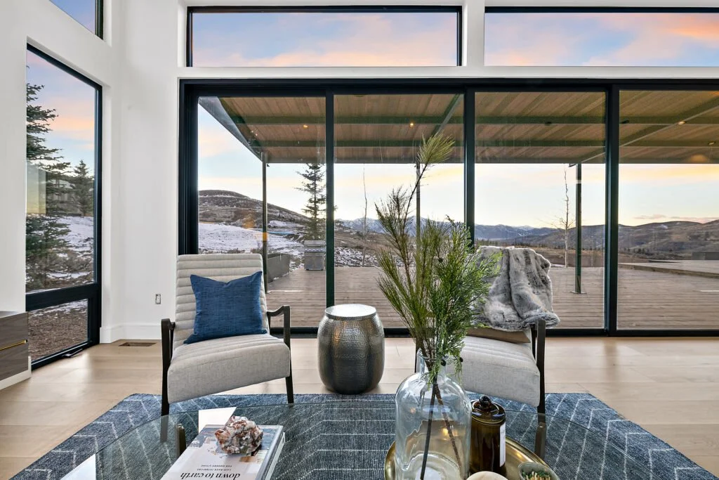 Icon-House-Benloch-Heber-City-Living-Room-Sliding-Glass-Doors-Covered-Deck-Mountain-View-Roderick-Builders-Modern-Custom.jpg