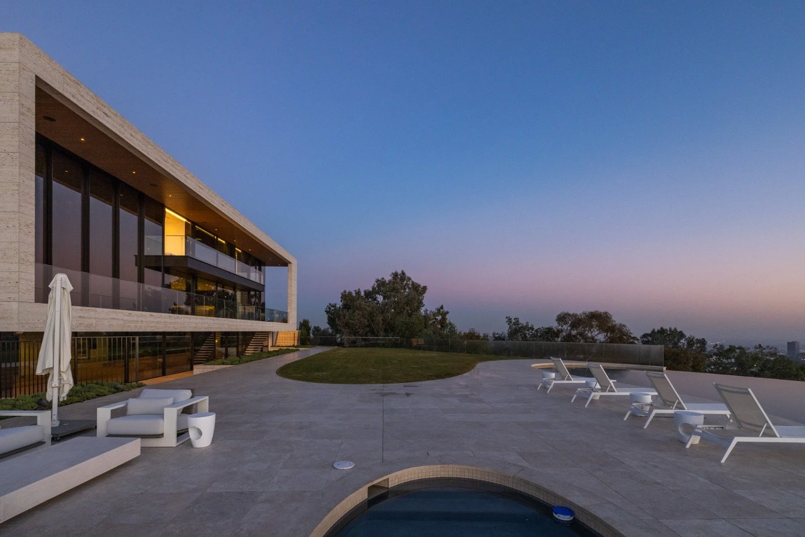 684-Firth-Brentwood-CA-LA-Exterior-Pool-Deck-Travertine-Terrace-Sunset-View-Modern-Lounge-Chairs-Roderick-Builders-Modern-Home.JPG