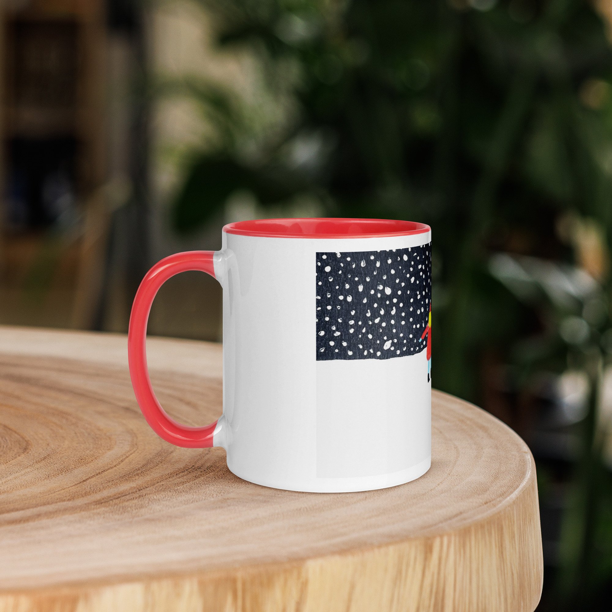 White ceramic mug with a red interior, side view