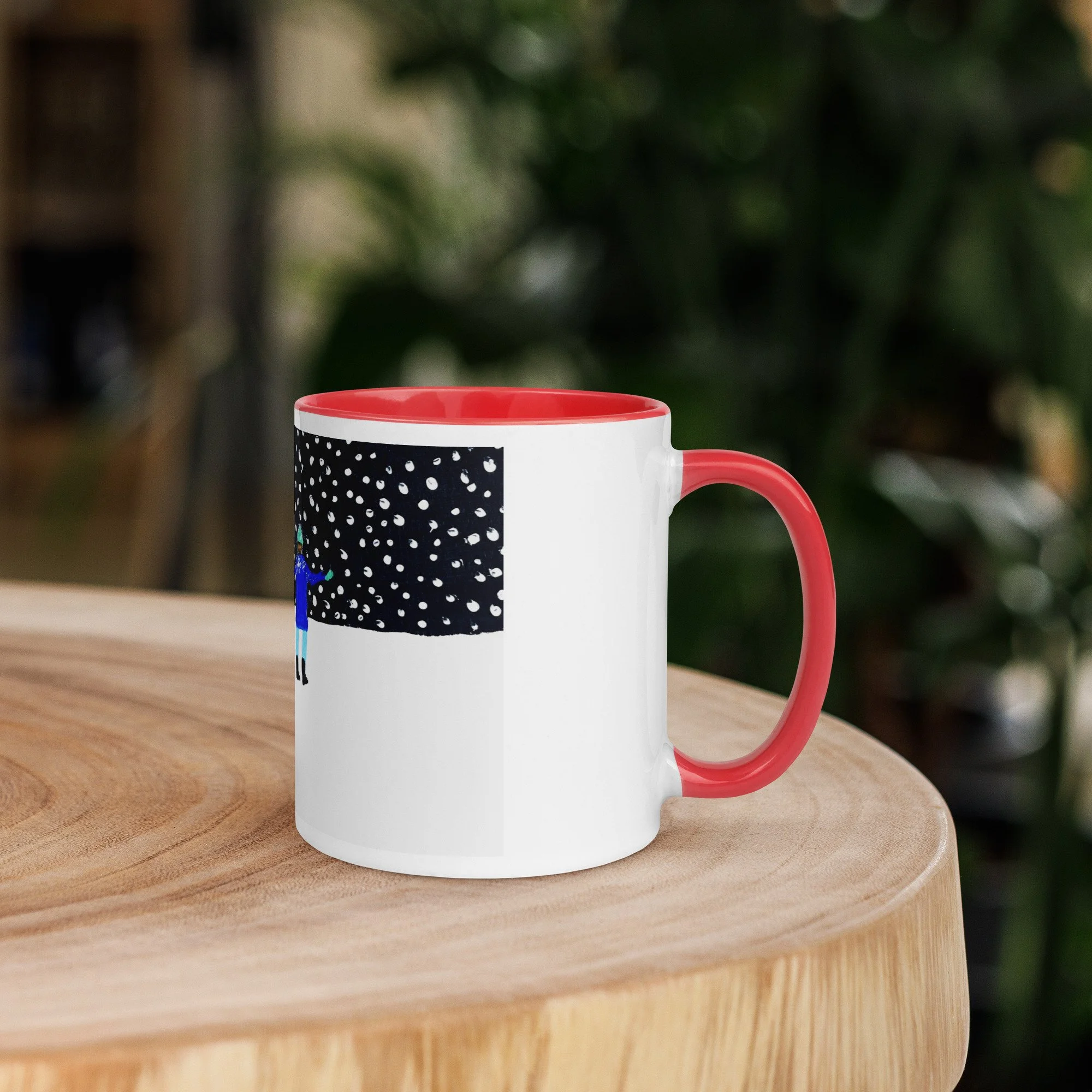White ceramic mug with a red interior, side view