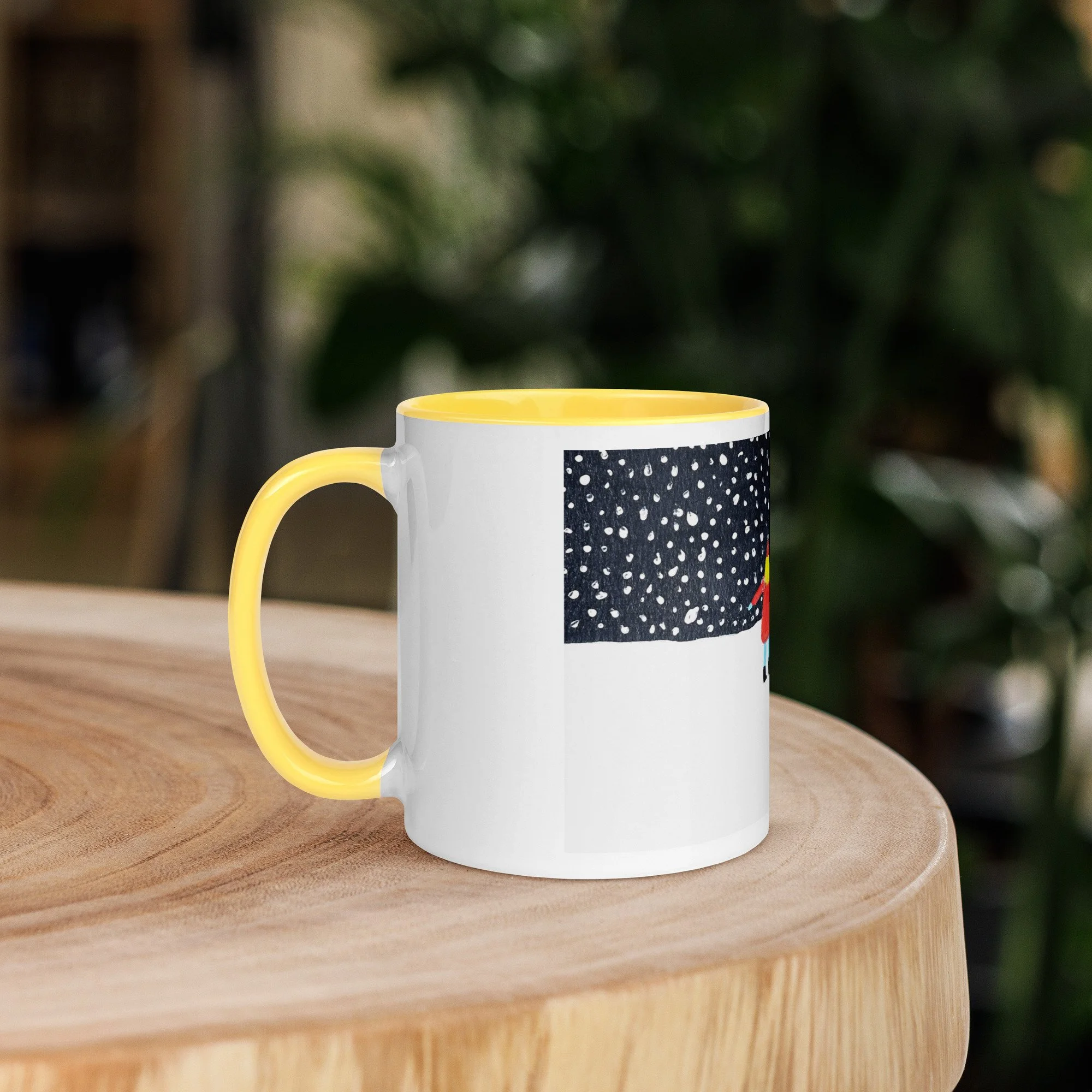 White ceramic mug with a yellow interior, side view