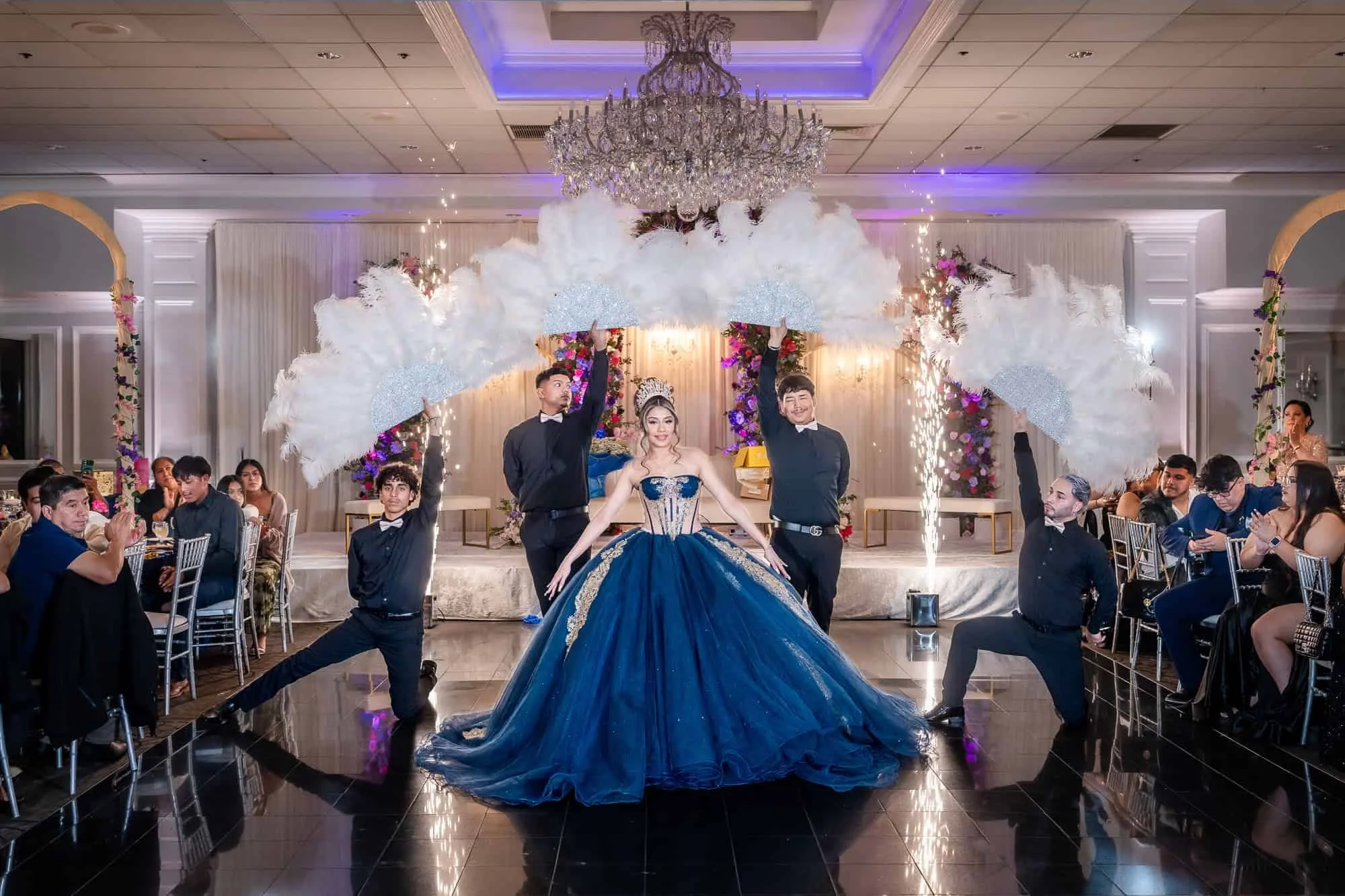 Quinceañera dancing with her chambelanes during the reception celebration at The Empress in Addison, Illinois.