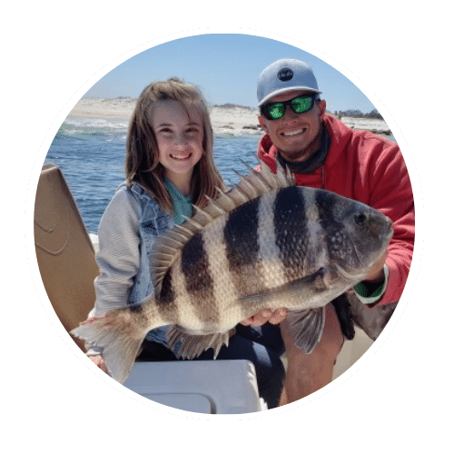 Anglers with a sheepshead on a Pensacola charter
