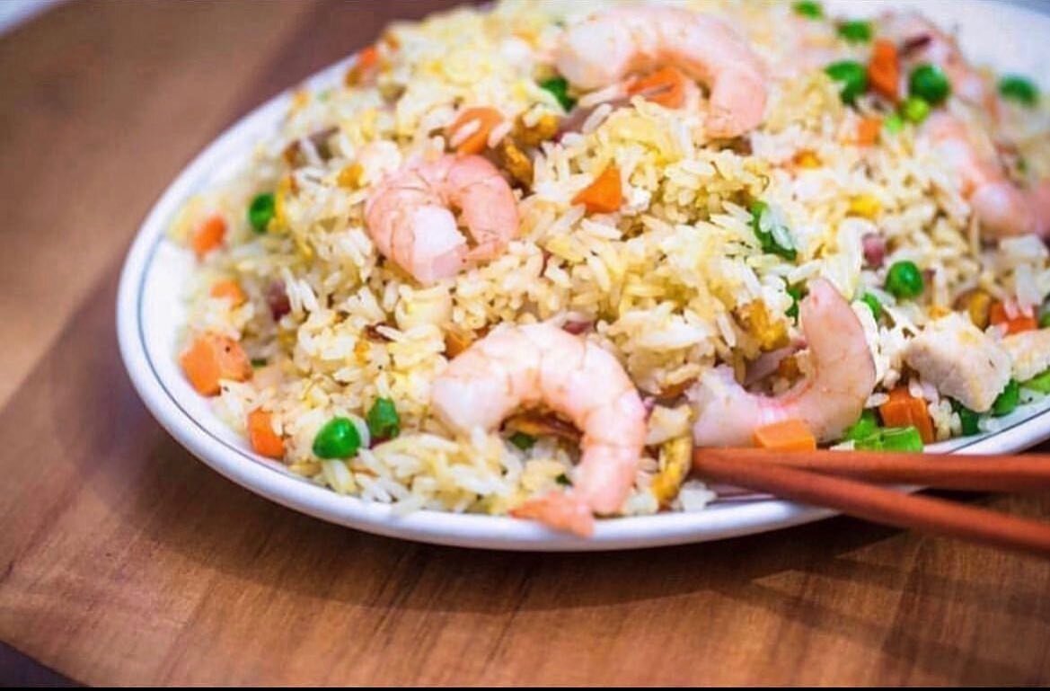 Shrimp, BBQ pork, egg, and veggies, all tossed into white rice and swirled around until perfectly incorporated. The legendary Yangtze Fried Rice 🤩